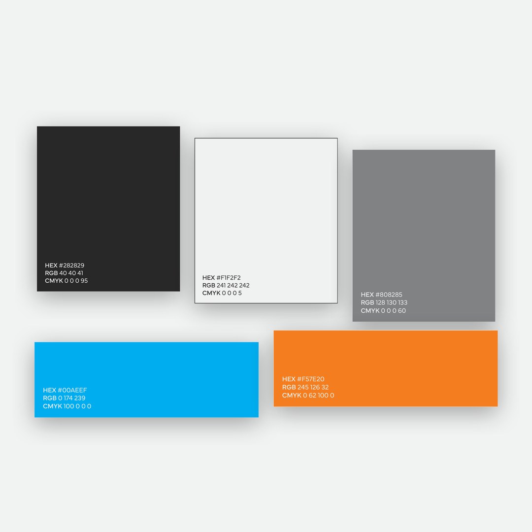 Amped Up Air colour palette of charcoal, light grey, mid grey, blue and orange