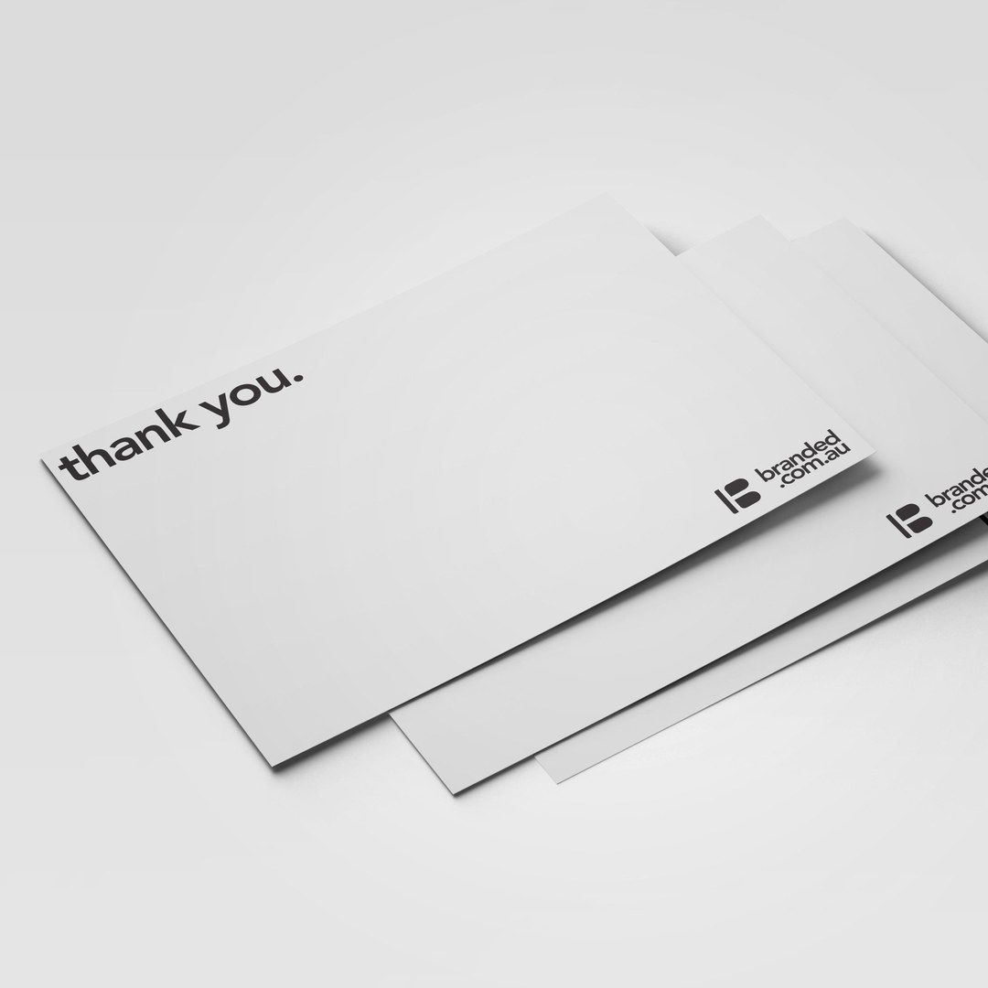 Stack of thank-you cards printed with the branded.com.au logo