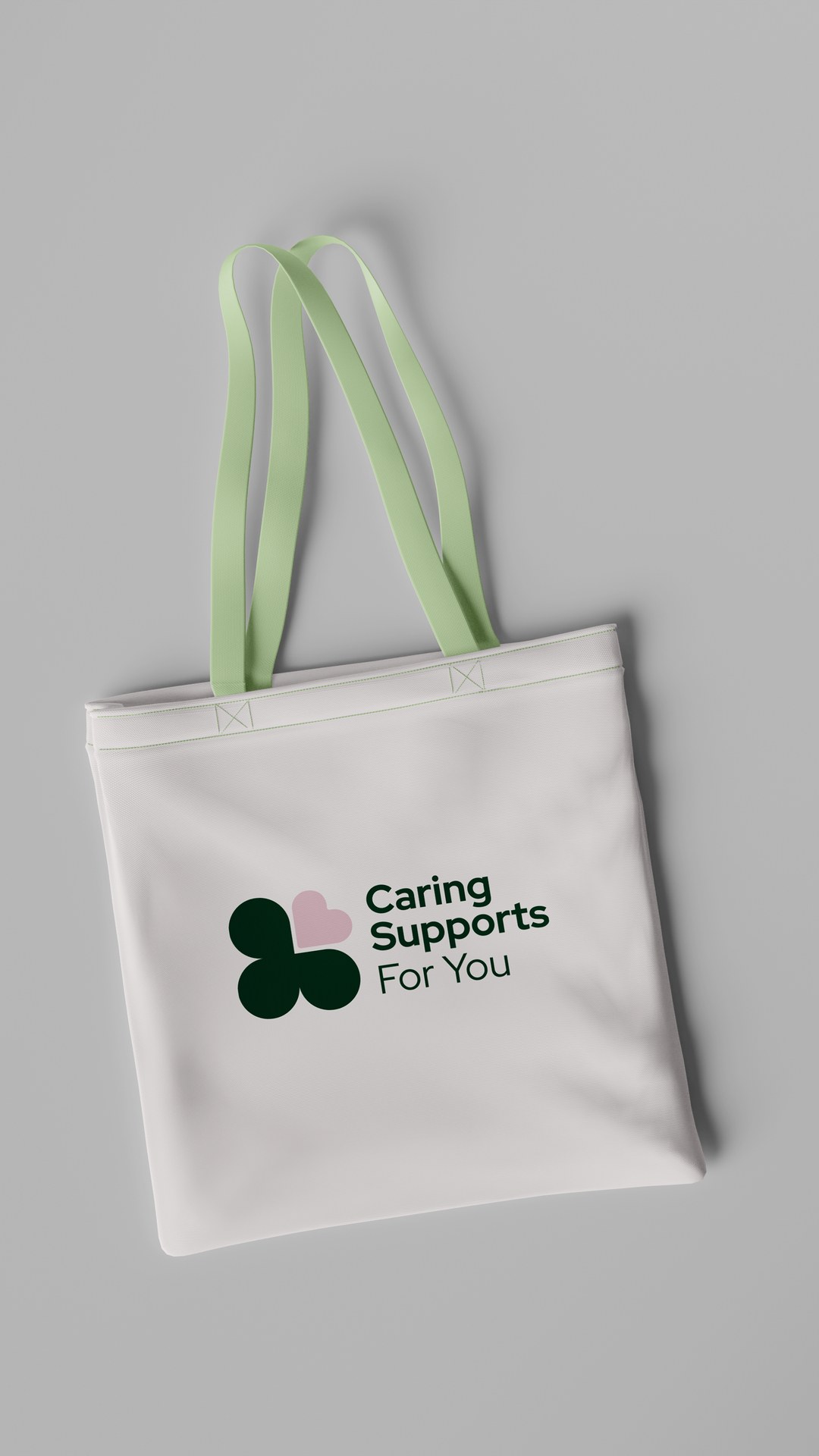Canvas tote bag printed with the Caring Supports For You logo