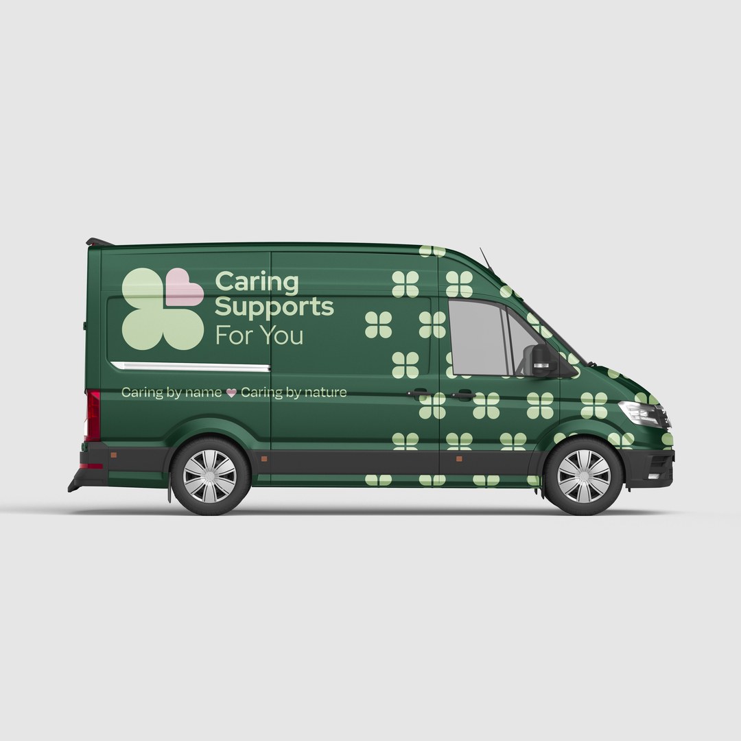 Caring Supports For You green van wrapped with the logo and a clover pattern