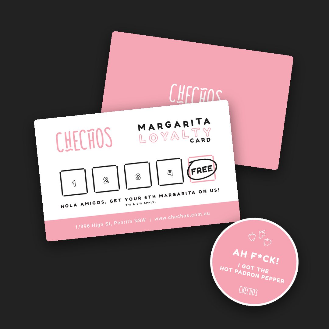 Checho’s margarita loyalty card beside a pink card back and a round sticker