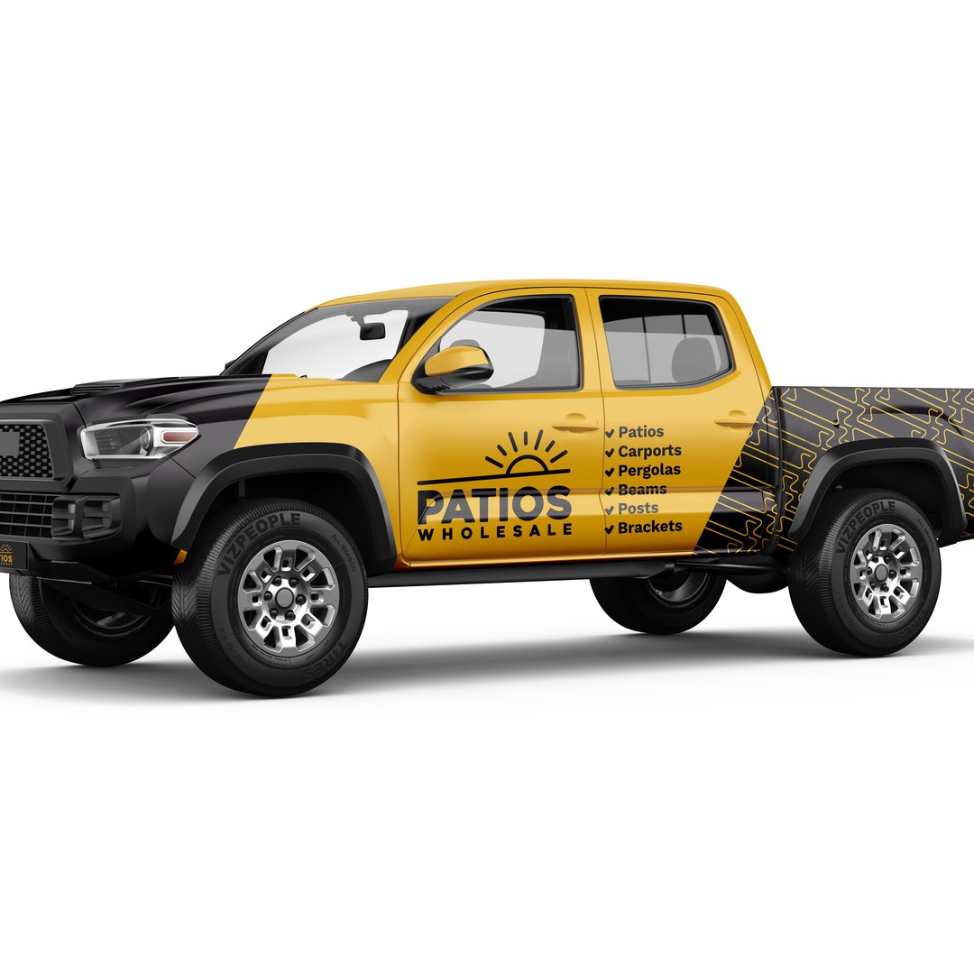 Patios Wholesale yellow and black ute wrapped with the logo and product list