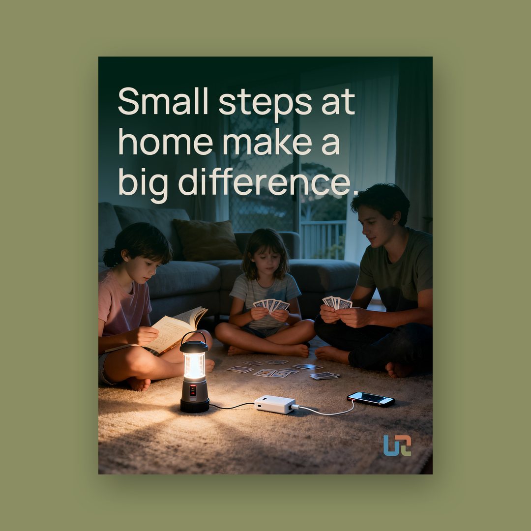 Poster of a family playing cards by lantern light, reading Small steps at home make a big difference